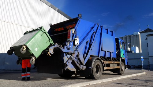 Company van at a commercial site preparing for waste collection